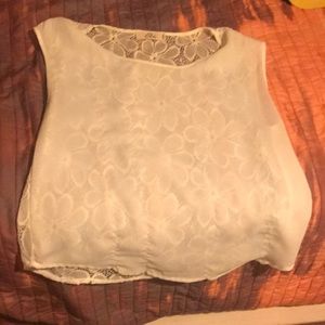 White blouse with flower lace detail in back